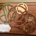 Citrus Slice, Shield, Steering Wheel, Triplex, and Twisted Metal Tags Spellbinders Card